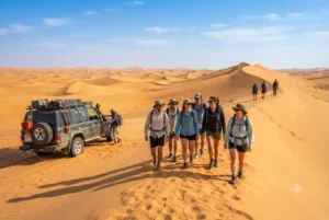 Adventure tourists exploring desert dunes and outdoor activities in the UAE