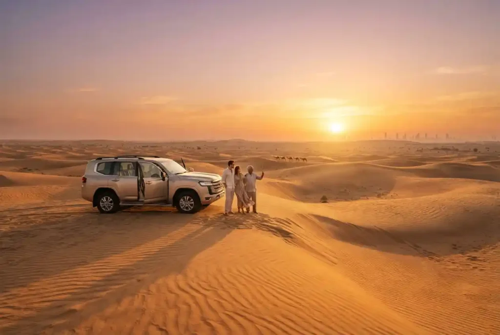 Sunset desert safari in Dubai with golden dunes and 4x4 vehicle